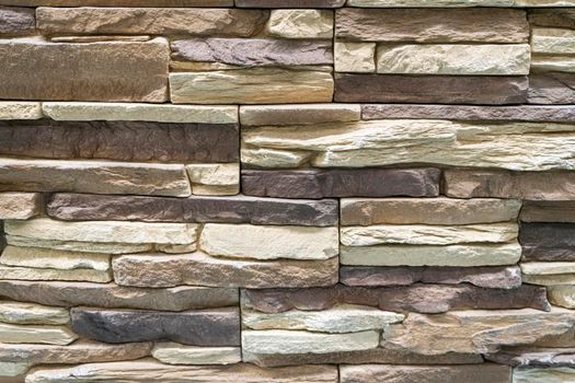 masonry wall paving stones as a background close up