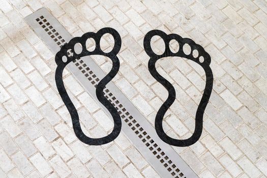 footprints on the tile in the shower. High quality photo