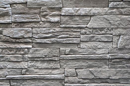 masonry wall paving stones as a background close up