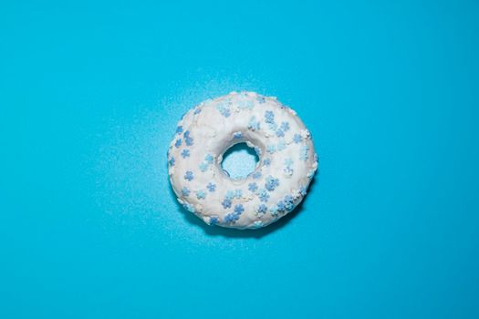 donut donuts on a blue background close-up. isolate. High quality photo
