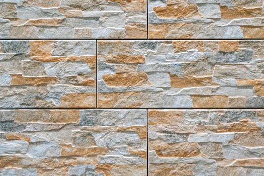 masonry wall paving stones as a background close up