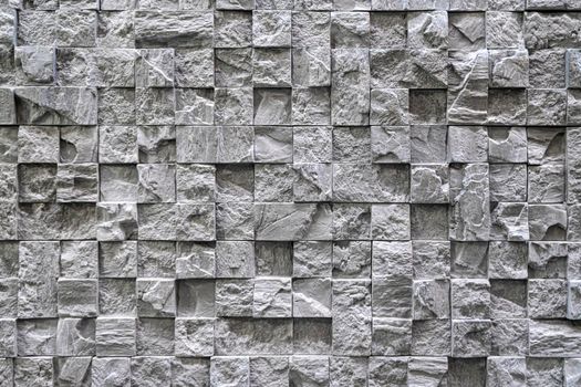 masonry wall paving stones as a background close up