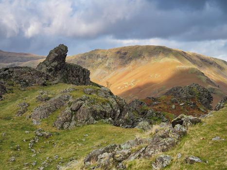 The rock formation known as 'The Howitzer' on Helm Crag overlooking Steel Crag on the other side of the valley, Lake District, UK