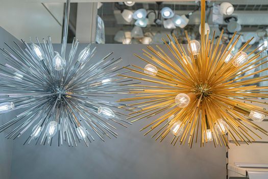 lamps chandeliers on the shelves of stores. High quality photo