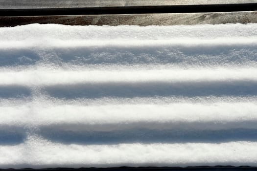 park bench with snow in Germany