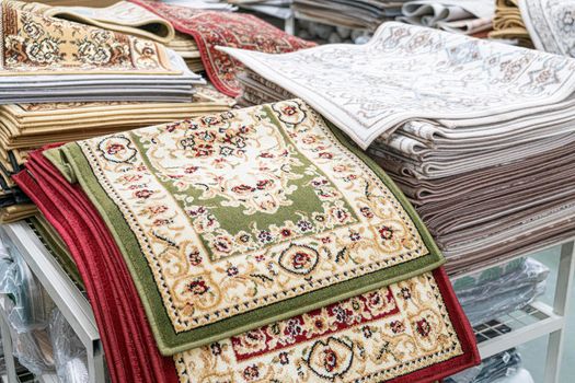 wool carpets on the shelves of stores. High quality photo