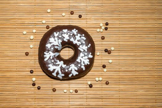 donut donuts on a bamboo background close-up. isolate. High quality photo