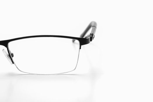 glasses for vision on a white background isolate macro. High quality photo