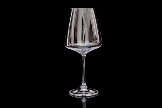 glass of wine on a green background isolate