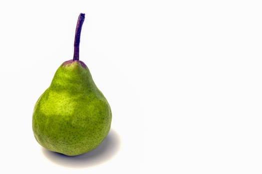 green pear close-up on a white background. High quality photo