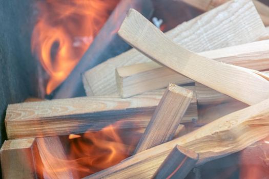 wood burning in the fire close up. High quality photo