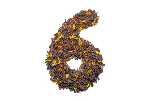 figure six of black tea with flower petals and pieces of fruit isolate. High quality photo