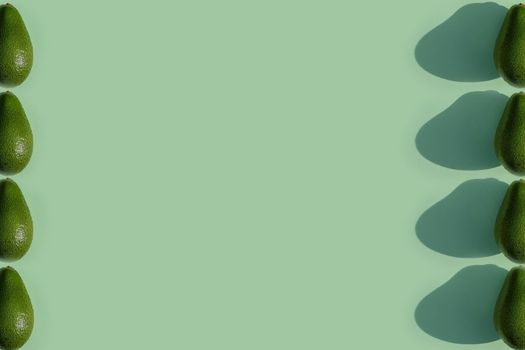 avocado color on a solid background, the top view pattern. High quality photo