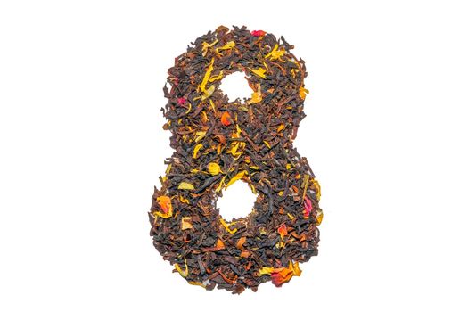 figure eight of black tea with flower petals and pieces of fruit isolate. High quality photo