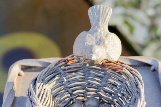 flower with a butterfly made of metal. High quality photo