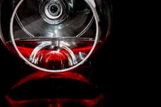 glass of wine on a green background isolate