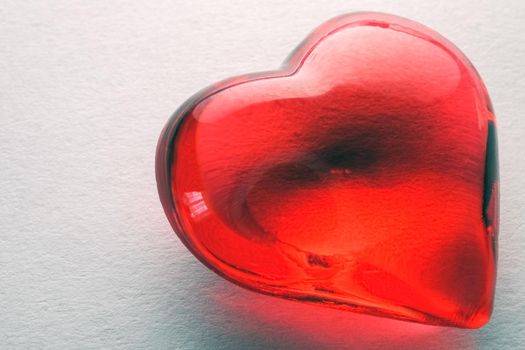 glass heart on a white background isolate. High quality photo