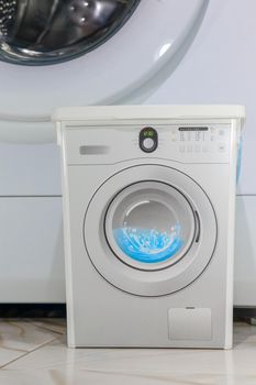 washing machine close - up as background. High quality photo