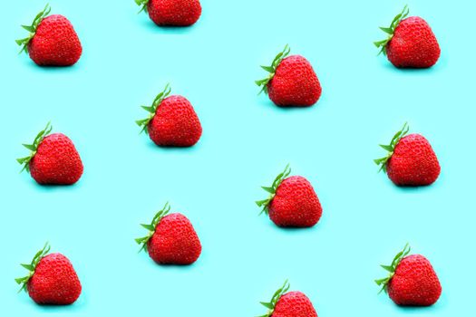 colorful strawberry pattern on a colorful background top view. High quality photo