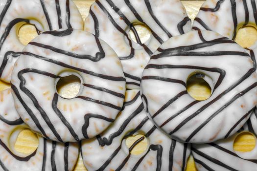 cookies in white chocolate on a wooden background top view. High quality photo