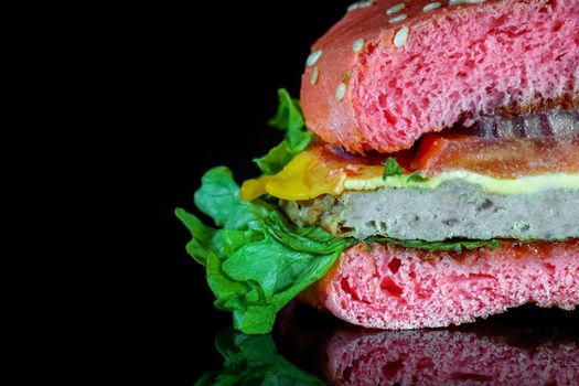 red hamburger on a black background macro. High quality photo