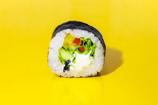 sushi on a yellow background close up. High quality photo