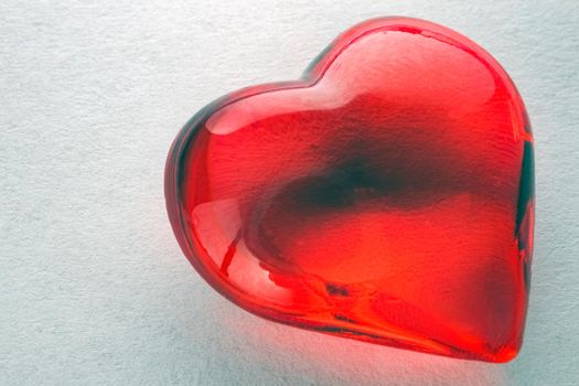 glass heart on a white background isolate. High quality photo