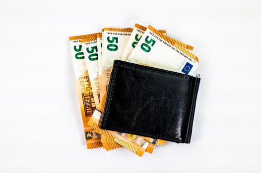 50 euro banknotes fanned with wallet on white background