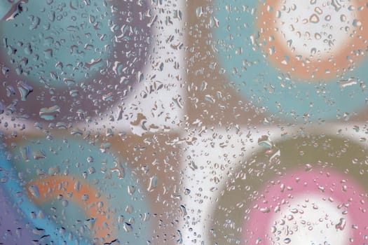 water drops on a multicolored background close up macro