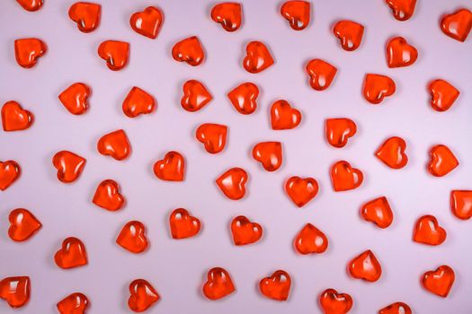 glass hearts on a purple background macro. High quality photo