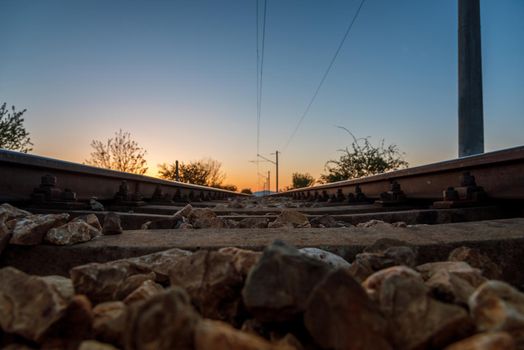 beautiful sunset railway line in dramatic sky