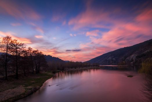 Colorful sky and clouds over Pancharevo, Bulgaria.Beautiful sunset with red sky