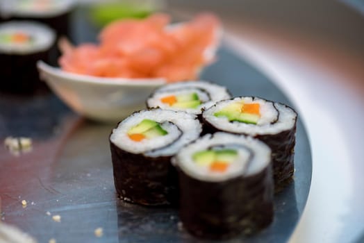 Hot Sushi roll with salmon. Japanese food.