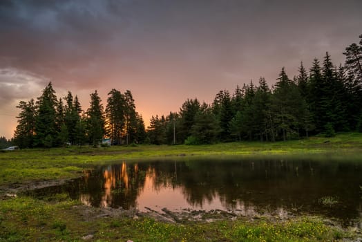 Lake sunrise / Beautiful sunrise view of Shiroka Polyana dam in Rhodopi Mountains, Bulgaria