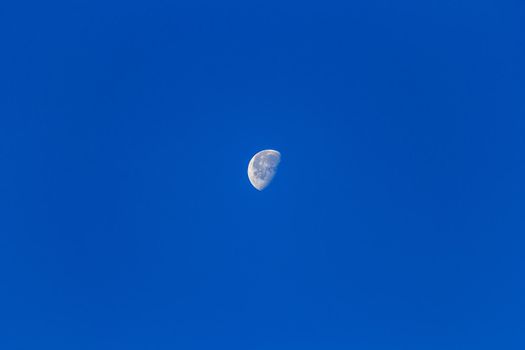 Clear blue sky with the moon background