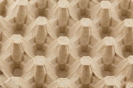 empty formed cardboard egg tray - closeup with edge-to-edge sharpness.
