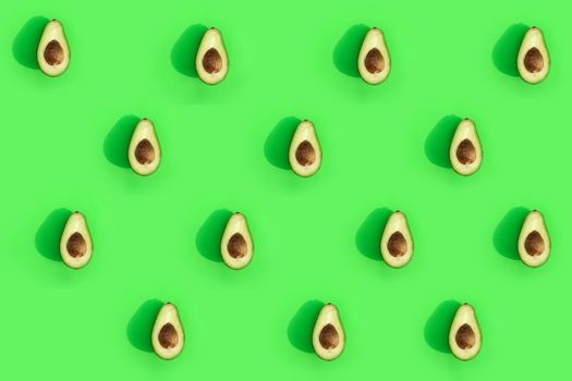 avocado color on a solid background, the top view pattern. High quality photo