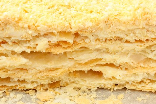 cut of a puff cake close-up on a white background. High quality photo