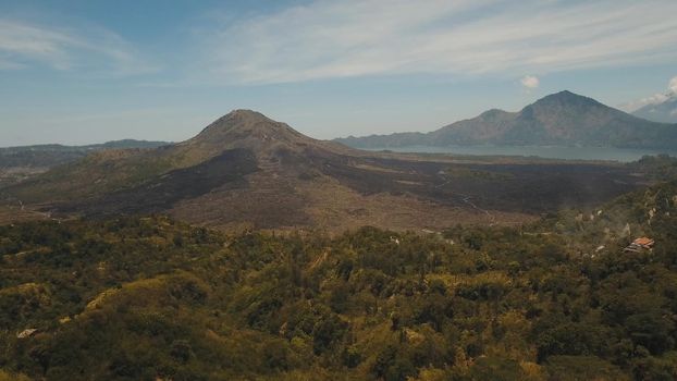Aerial view of Mount Batur Volcano in Kintamani. Bali volcano, also referred to as Kintamani is popular sightseeing destination in Bali. Travel concept.