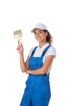 Portrait of female house painter with paint brush isolated on white background