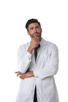 Young male medical doctor with stethoscope holding chin isolated on white background full length studio portrait