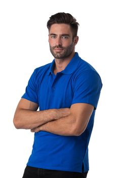 Portrait of healthy handsome model man in casual outfit posing with folded arms isolated on white background