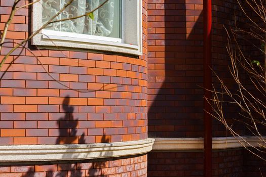 Clinker brick of brown color. Clinker thermal panels for finishing the facade of the house. Tiles for outdoor decoration
