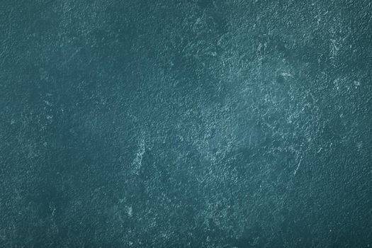 Blue background with paper texture, horizontal, blank space.