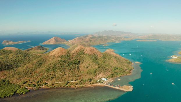aerial view seascape bay with islands and mountains in province of Palawan. Busuanga, Philippines. Seascape, islands covered with forest, sea with blue water. tropical landscape, travel concept