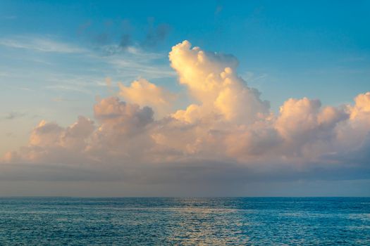 Beautiful sea Sunny landscape on the beach. Light waves of blue color spread all over the beach smoothly smoothing the Golden sand.