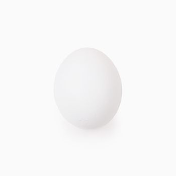 One Easter egg white on a white background. Isolated