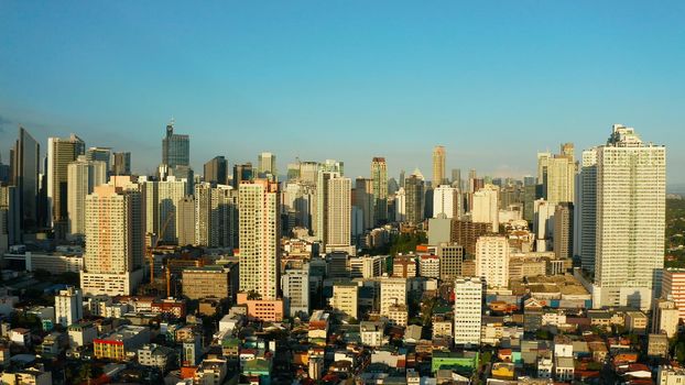 The city of Manila, the capital of the Philippines. Modern metropolis, top view. Modern buildings in the city center.
