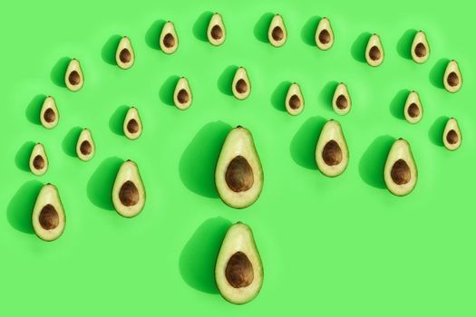 avocado color on a solid background, the top view pattern. High quality photo