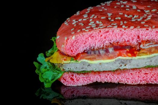 red hamburger on a black background macro. High quality photo